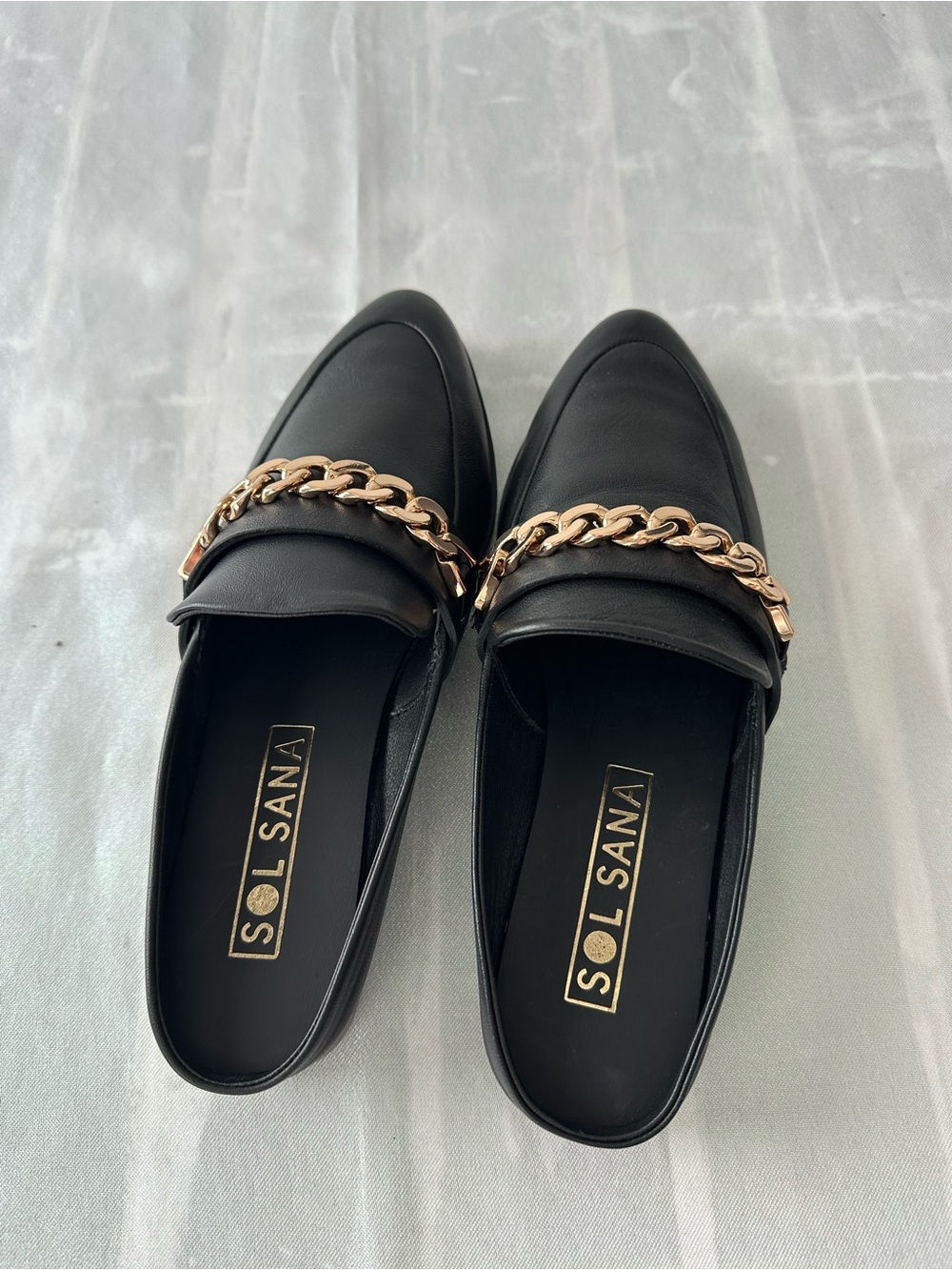 Sol Sana Black Leather Loafers with Gold Chain Accent